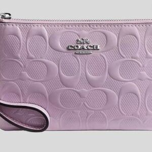 Coach Light Pink Embossed Clutch